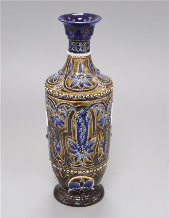 A Doulton Lambeth vase by Florence C. Roberts, dated 1879, incised with foliage between jewelled borders, height 25.5cm